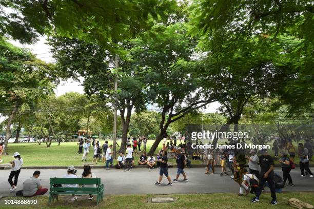 Pokemon Go enthusiasts gather in the park on August 11, 2018 in Bangkok, Thailand. Lumphini Park is one of the rare public spaces in the Thai...