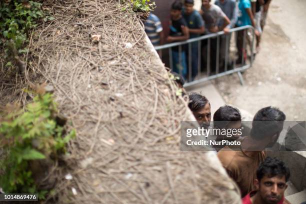Queue to food distribution in Refugee camp in Bihac, Bosnia and Herzegovina on August 10, 2018.
