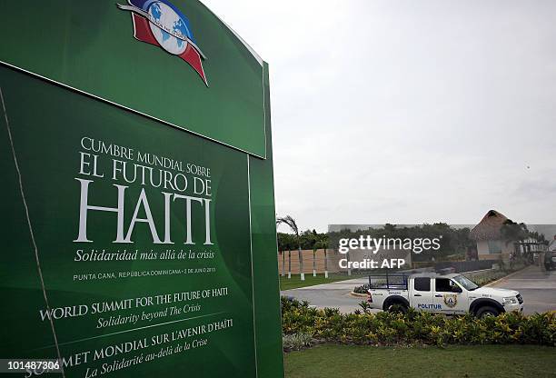 Dominican police truck stands guard outside the hotel where the "World Summit for the Future of Haiti" is to be held in the resort town of Punta...