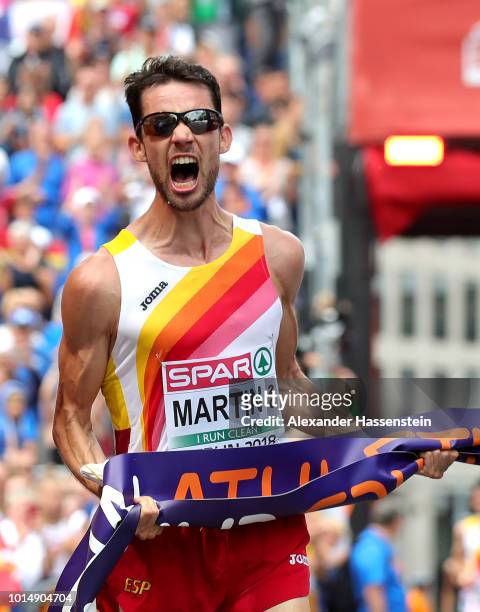 Alvaro Martin of Spain celebrates winning the Gold medal in in the Men's 20km Race Walk as he crosses the line during day five of the 24th European...