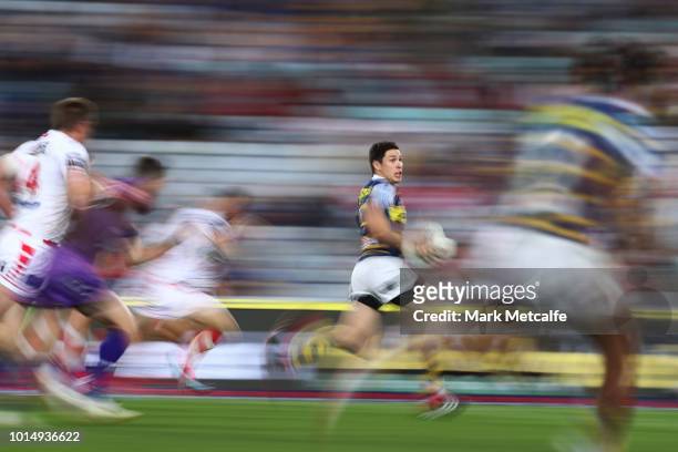 Mitchell Moses of the Eels makes a break to score a try during the round 22 NRL match between the Parramatta Eels and the St George Illawarra Dragons...