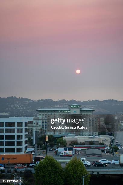 sunrise through mendocino complex fire smoke - emeryville stock pictures, royalty-free photos & images