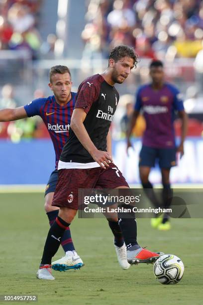 Manuel Locatelli of AC Milan passes the ball during the International Champions Cup match against FC Barcelona at Levi's Stadium on August 4, 2018 in...