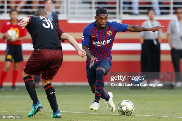 Malcom Silva of FC Barcelona looks to pass the ball during the International Champions Cup match against AC Milan at Levi's Stadium on August 4, 2018...