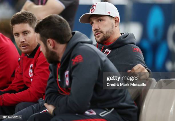 Gareth Widdop of the Dragons sits on the sidelines injured during the round 22 NRL match between the Parramatta Eels and the St George Illawarra...