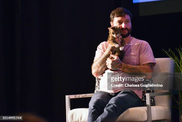 Lil Bub and Mike Bridavsky onstage during a panel at CatCon Worldwide 2018 at Pasadena Convention Center on August 5, 2018 in Pasadena, California.