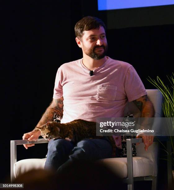 Lil Bub and Mike Bridavsky onstage during a panel at CatCon Worldwide 2018 at Pasadena Convention Center on August 5, 2018 in Pasadena, California.