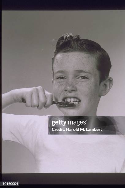 Freckled Boy Brushes His Teeth, 1950