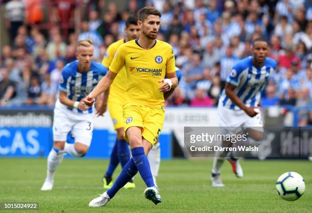 Jorginho of Chelsea scores a penalty for his team's second goal during the Premier League match between Huddersfield Town and Chelsea FC at John...
