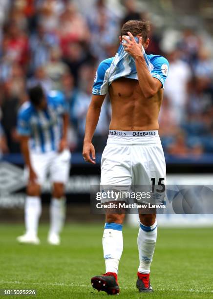 Chris Lowe of Huddersfield Town looks dejected as Chelsea are awarded a penalty during the Premier League match between Huddersfield Town and Chelsea...