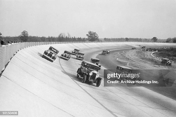 a motor car race, circa 1930 - autorennen stock-fotos und bilder