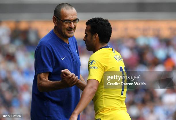 Pedro of Chelsea is embraced by Maurizio Sarri, Manager of Chelsea after being substituted during the Premier League match between Huddersfield Town...