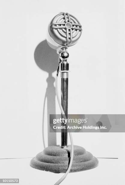 microphone against white background - old fashioned microphone stock pictures, royalty-free photos & images