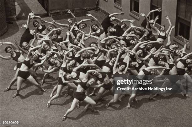 women exercising in a courtyard, 1930s - 1930s woman stock pictures, royalty-free photos & images