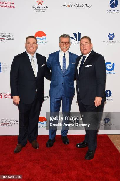 Michael Buffer and the Pump brothers attend the 18th Annual Harold and Carole Pump Foundation Gala at The Beverly Hilton Hotel on August 10, 2018 in...