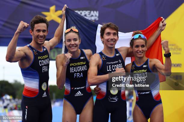 Dorian Coninx, Leonie Periault, Pierre Le Corre and Cassandre Beaugrand of France celebrates after winning the Mixed Team Relay Triathlon on Day Ten...