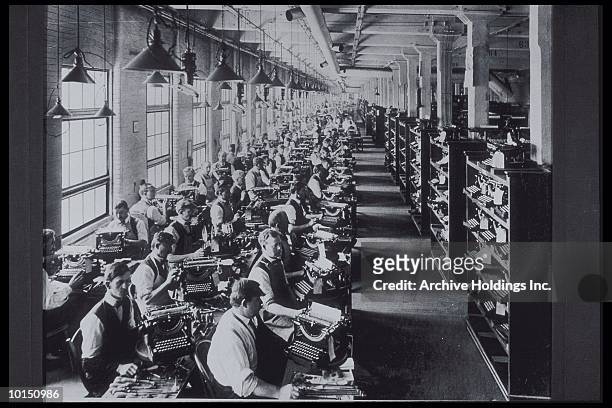 factory typewriter assembly, 1920s - labor intensive production line stock pictures, royalty-free photos & images