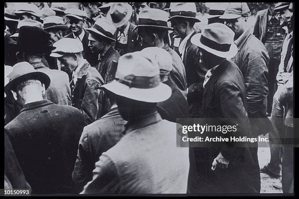 crowd of men, 1930, jackets and hats - great depression 1930s stock pictures, royalty-free photos & images