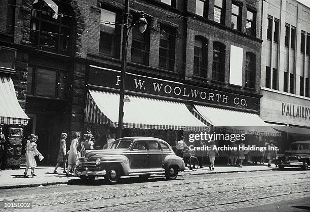 people walking by window, shop - 1950s stock pictures, royalty-free photos & images