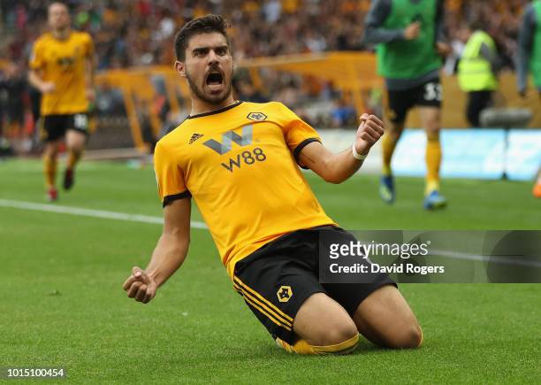 Ruben Neves of Wolverhampton Wanderers celebrates after scoring their first goal during the Premier League match between Wolverhampton Wanderers and...