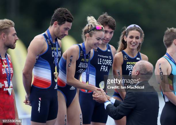 Cassandre Beaugrand of France receives her gold medal after winning the Mixed Team Relay Triathlon eith Team France on Day Ten of the European...