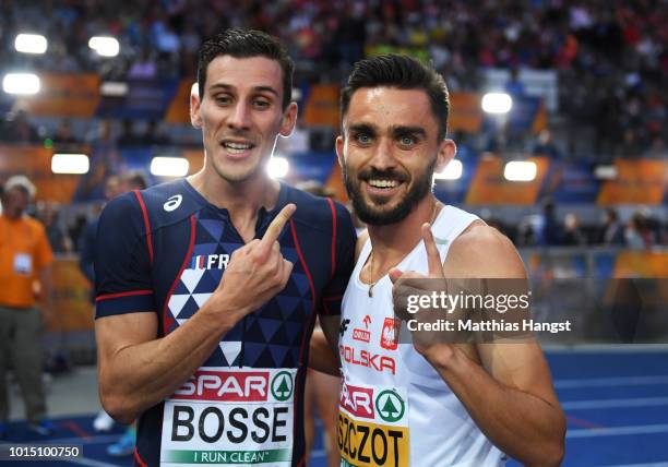 Gold medalist Adam Kszczot of Poland and Bronze Medalist Pierre-Ambroise Bosse of France celebrate winning their respecitve medals in the Men's 800m...