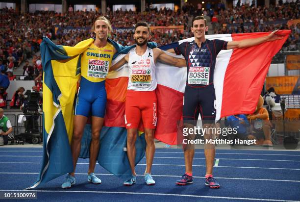 Silver Medalist Andreas Kramer, Gold medalist Adam Kszczot of Poland and Bronze Medalist Pierre-Ambroise Bosse of France celebrate winning their...