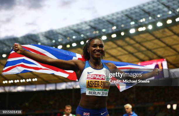 Dina Asher-Smith celebrates winning the Gold medal in the Women's 200m Final during day five of the 24th European Athletics Championships at...