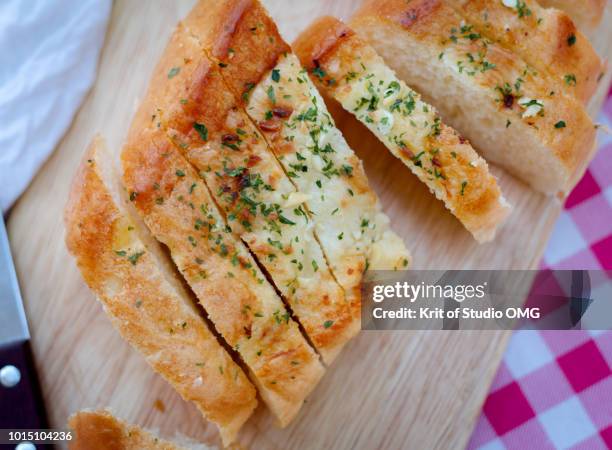 sliced of garlic bread - garlic bread stock pictures, royalty-free photos & images