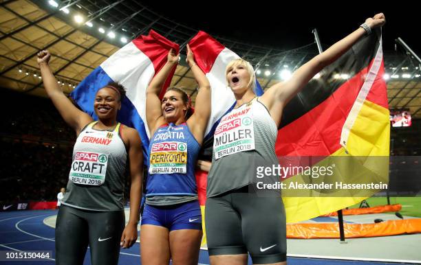 Bronze medalist Shanice Craft of Germany, Silver medalist Nadine Mueller of Germany, and Gold medalist Sandra Perkovic of Croatia celebrate after the...