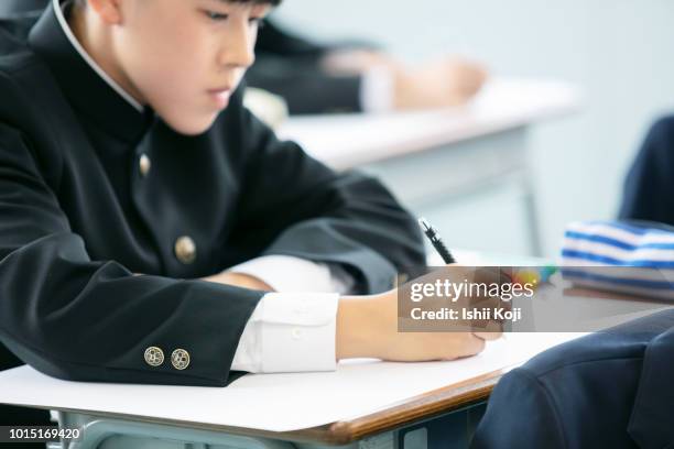 lesson scene of junior high school students - 制服 ストックフォトと画像