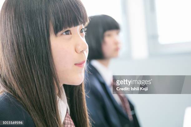 lesson scene of junior high school students - japan 12 years girl stock pictures, royalty-free photos & images