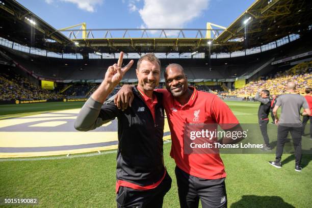 Liverpools Sander Westerveld and Salif Diao react before the friendly game Borussia Dortmund Legends - FC Liverpool Legends during the session...