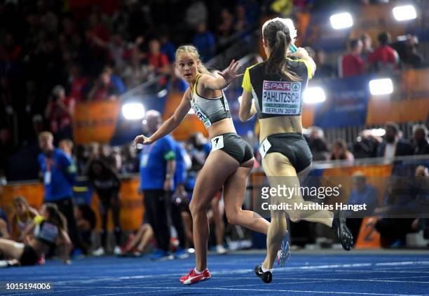 Karolina Pahlitzsch of Germany hands the batton over to Hannah Mergenthaler of Germany during the Women's 4x400m Relay race during day five of the...