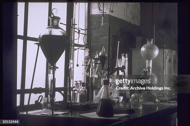 chemical equipment on table of lab, circa 1930s - 1930s era stock pictures, royalty-free photos & images