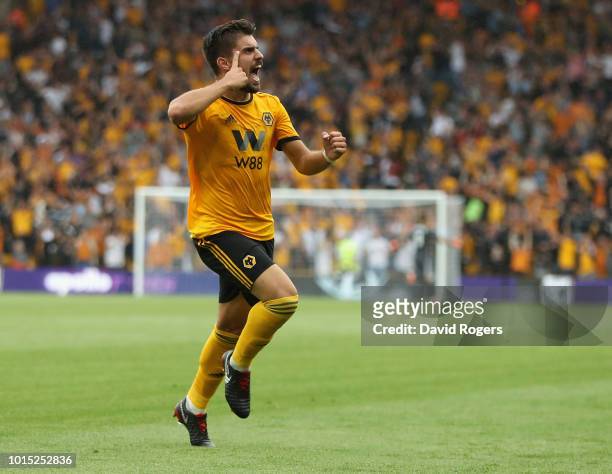 Ruben Neves of Wolverhampton Wanderers celebrates after scoring their first goal during the Premier League match between Wolverhampton Wanderers and...