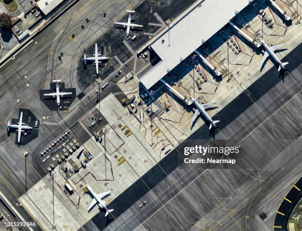 parking airplanes, adelaide airport, south australia - adelaide aerial stock pictures, royalty-free photos & images