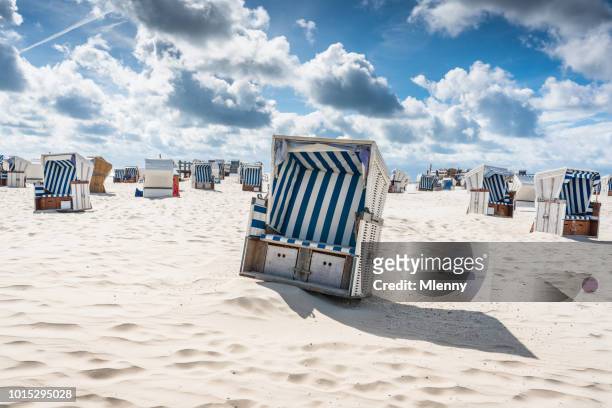 st. peter-ording hooded beach chairs nordsee germany - hooded beach chair stock pictures, royalty-free photos & images