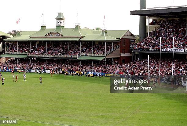 Tony Lockett of the Sydney Swans kicks the 1300th goal of his career during the AFL Round 10 match against the Collingwood Magpies at the SCG in...