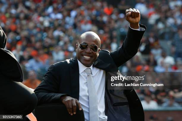 Former San Francisco Giants player Barry Bonds looks on during a ceremony to retire his jersey at AT&T Park on August 11, 2018 in San Francisco,...