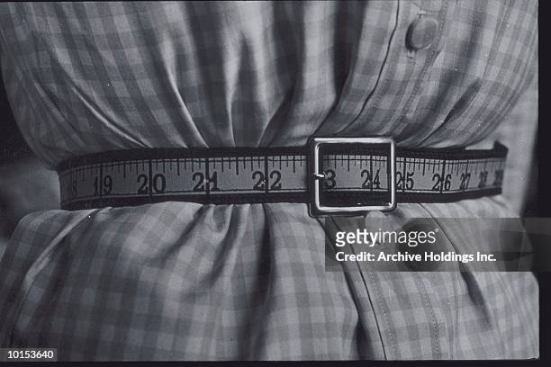 tape measure belt, 23 inch waist, c 1950 - fat woman funny imagens e fotografias de stock