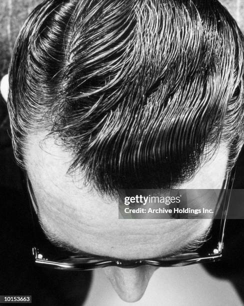 top of mans head, hair slicked with pomade - top of head stock pictures, royalty-free photos & images