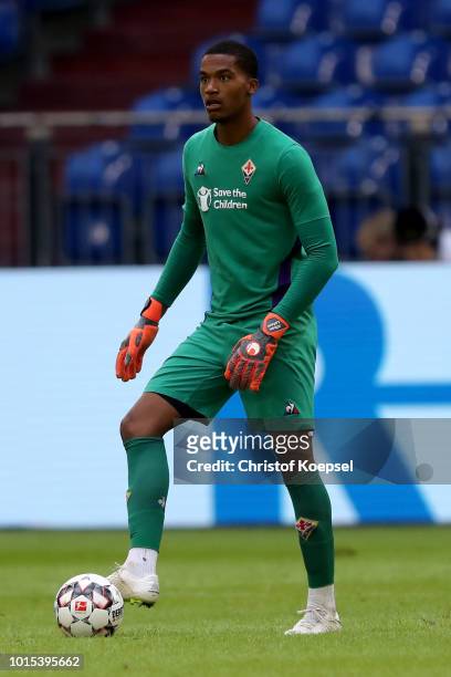 Alban Lafont of Fiorentina runs with the ball during the friendly match between FC Schalke 04 v AFC Fiorentina at Veltins Arena on August 11, 2018 in...