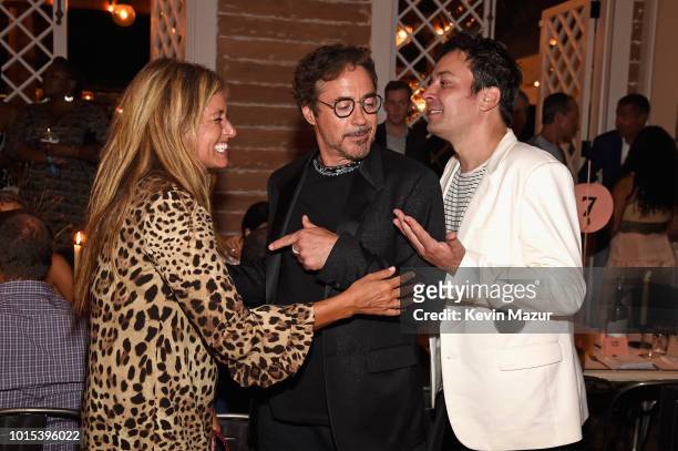Nancy Juvonen, Robert Downey Jr., and Jimmy Fallon attend Apollo in the Hamptons 2018: Hosted by Ronald O. Perelman at The Creeks on August 11, 2018...