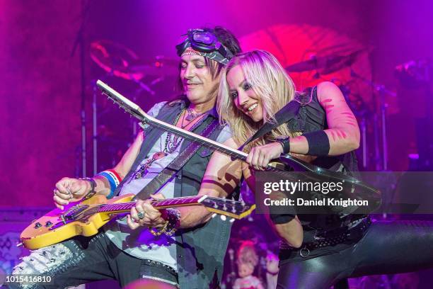 Guitarists Ryan Roxie and Nita Strauss of Alice Cooper perform on stage at Pechanga Casino on August 11, 2018 in Temecula, California.