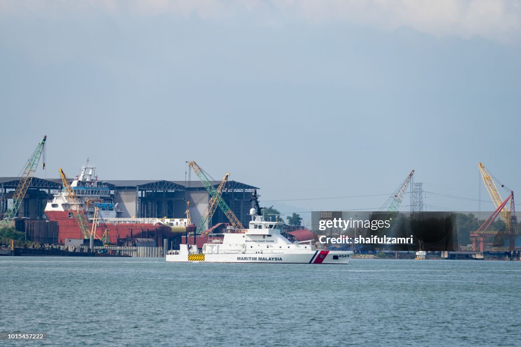 Malaysian coast guard boat perform a daily patrol for any anomaly activities at Port Klang, Malaysia.