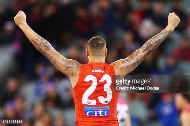 Lance Franklin of the Swans celebrates the win on the final siren during the round 21 AFL match between the Melbourne Demons and the Sydney Swans at...