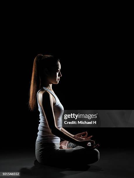 woman of yogi who straightens breath - michael sit stock pictures, royalty-free photos & images