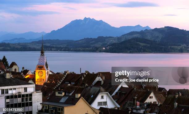 clock tower, mount pilatus, lake zug, zug, switzerland - schweiz stadt landschaft stock-fotos und bilder