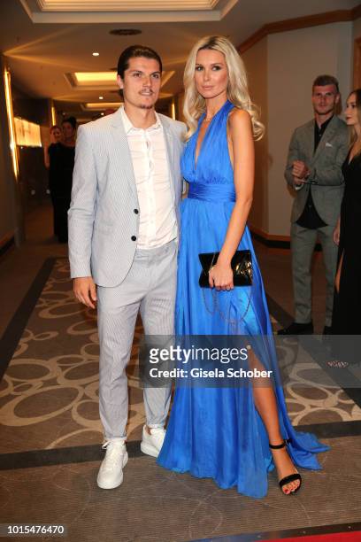 Soccer Player of RB Leipzig, Marcel Sabitzer and his girlfriend Katja Kuehne during the 11th GRK Golf Charity Masters reception on August 11, 2018 at...